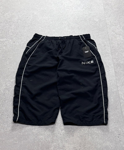 Vintage 2000s Nike Spellout 3/4 Track Shorts (XL)