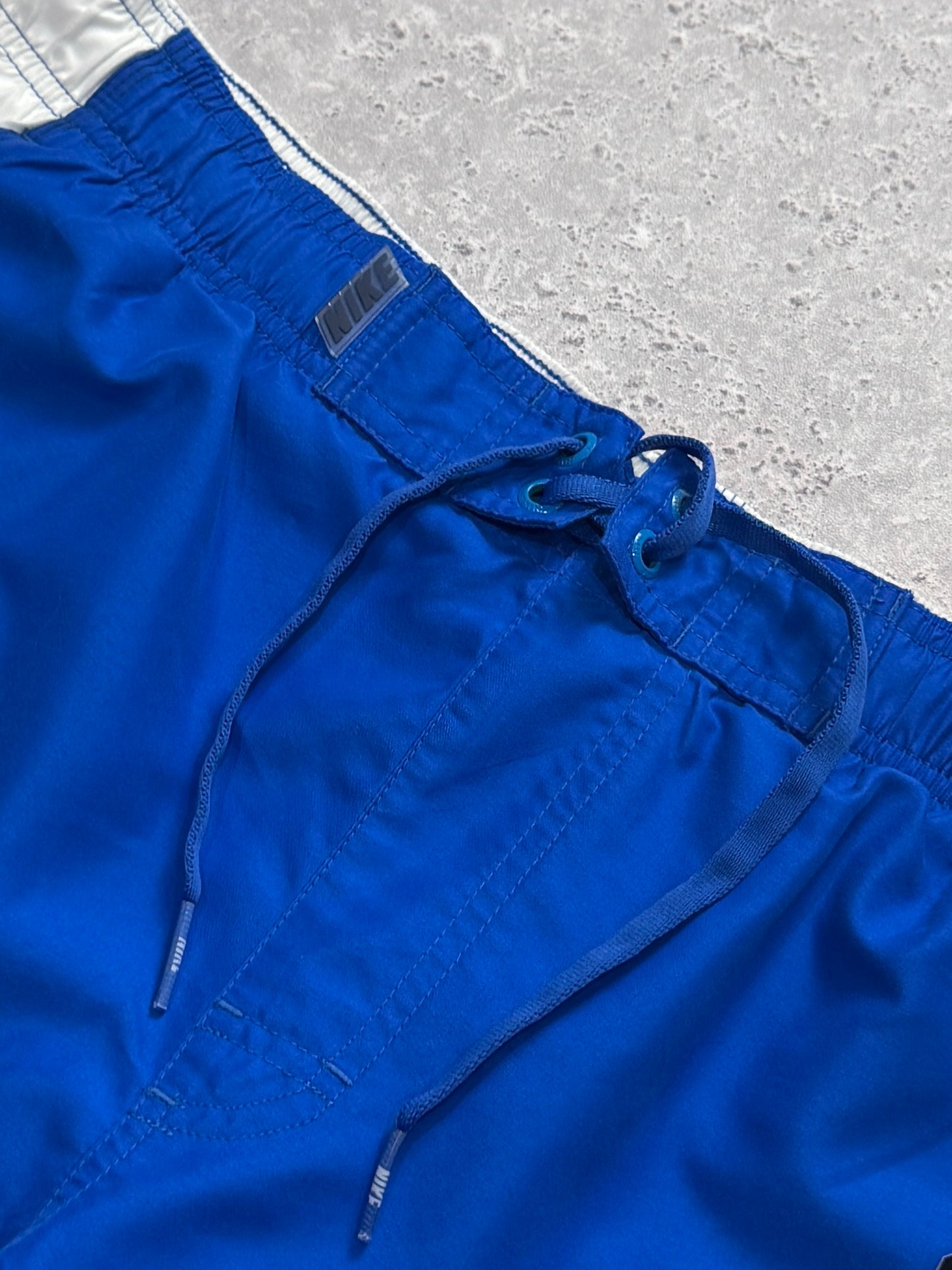 Vintage 2000s Nike Spellout Track Shorts (L)