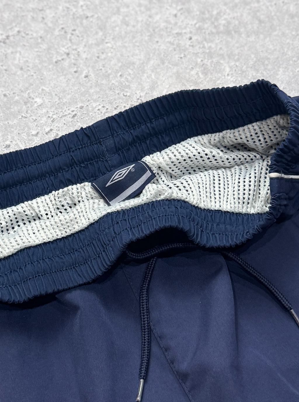 Vintage 2000s Umbro Track Shorts (L)