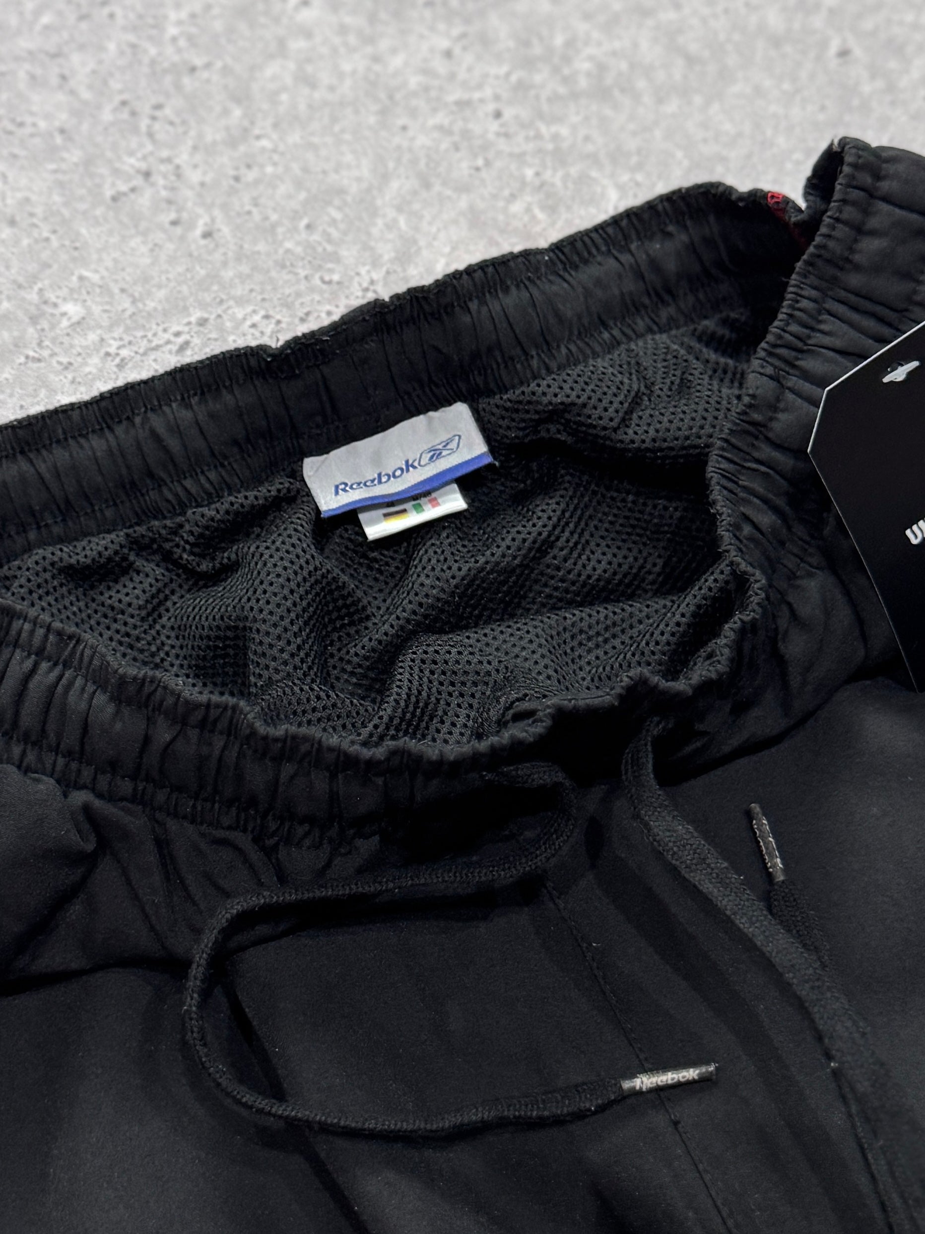 Vintage 2000s Reebok 3/4 Track Shorts (S)