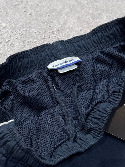 Vintage 2000s Reebok Spellout 3/4 Track Shorts (S)