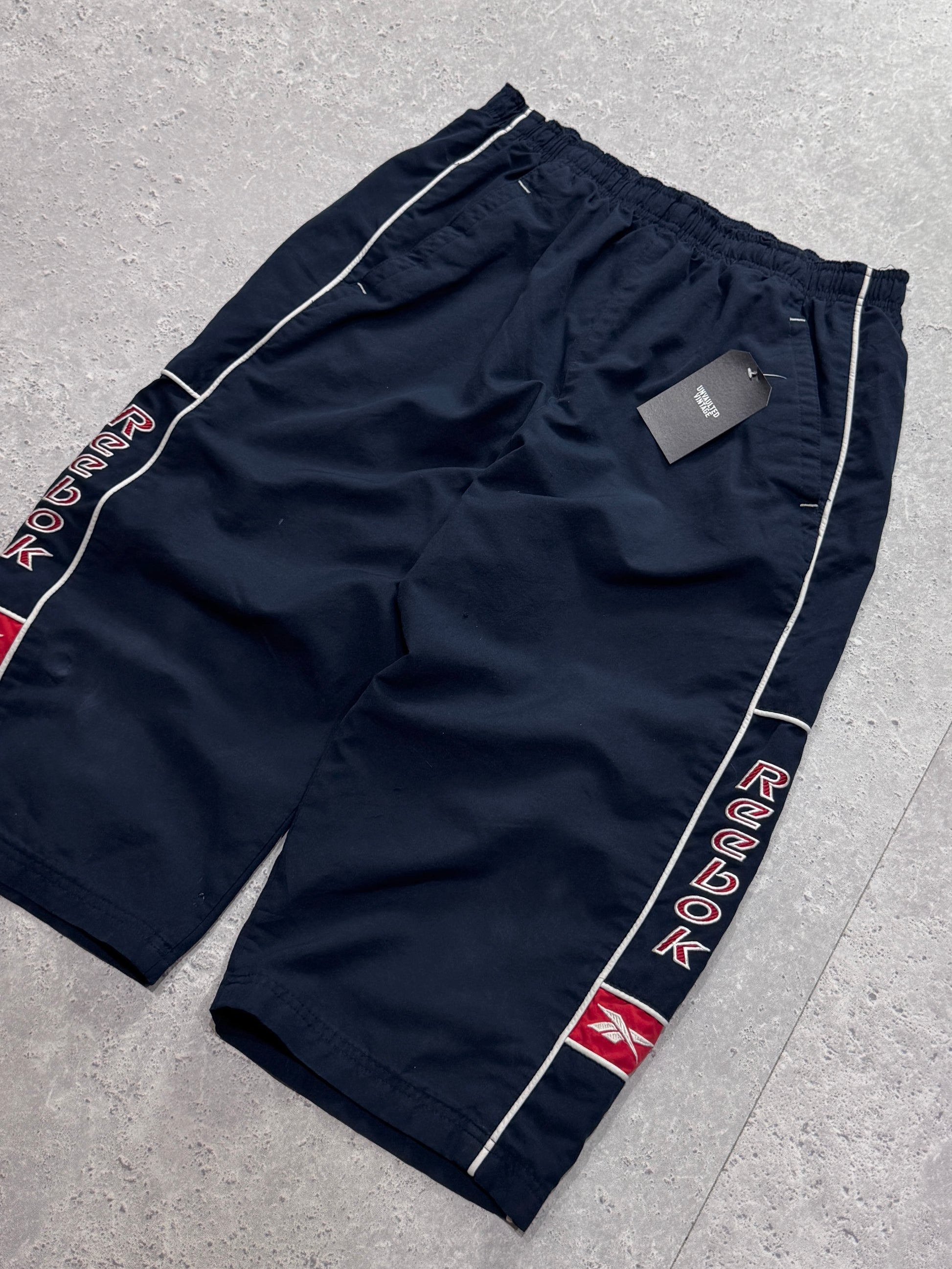 Vintage 2000s Reebok Spellout 3/4 Track Shorts (M)
