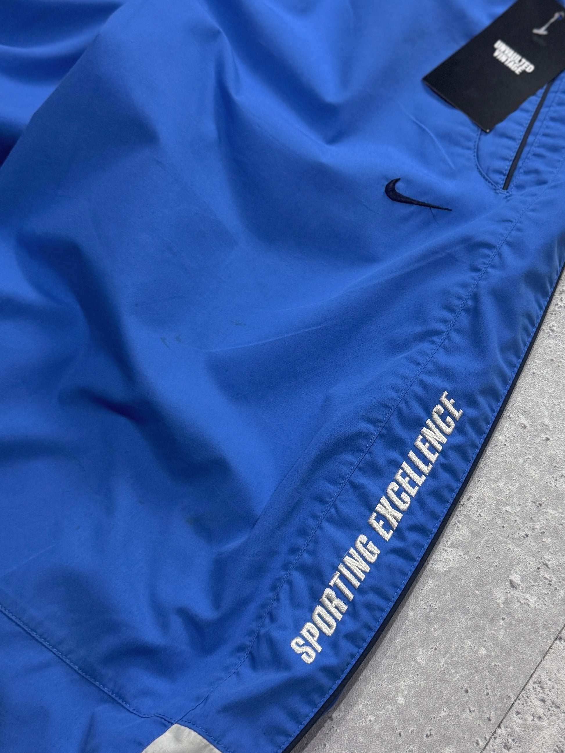 Vintage 2000s Nike Sporting Excellence Track Shorts (M)