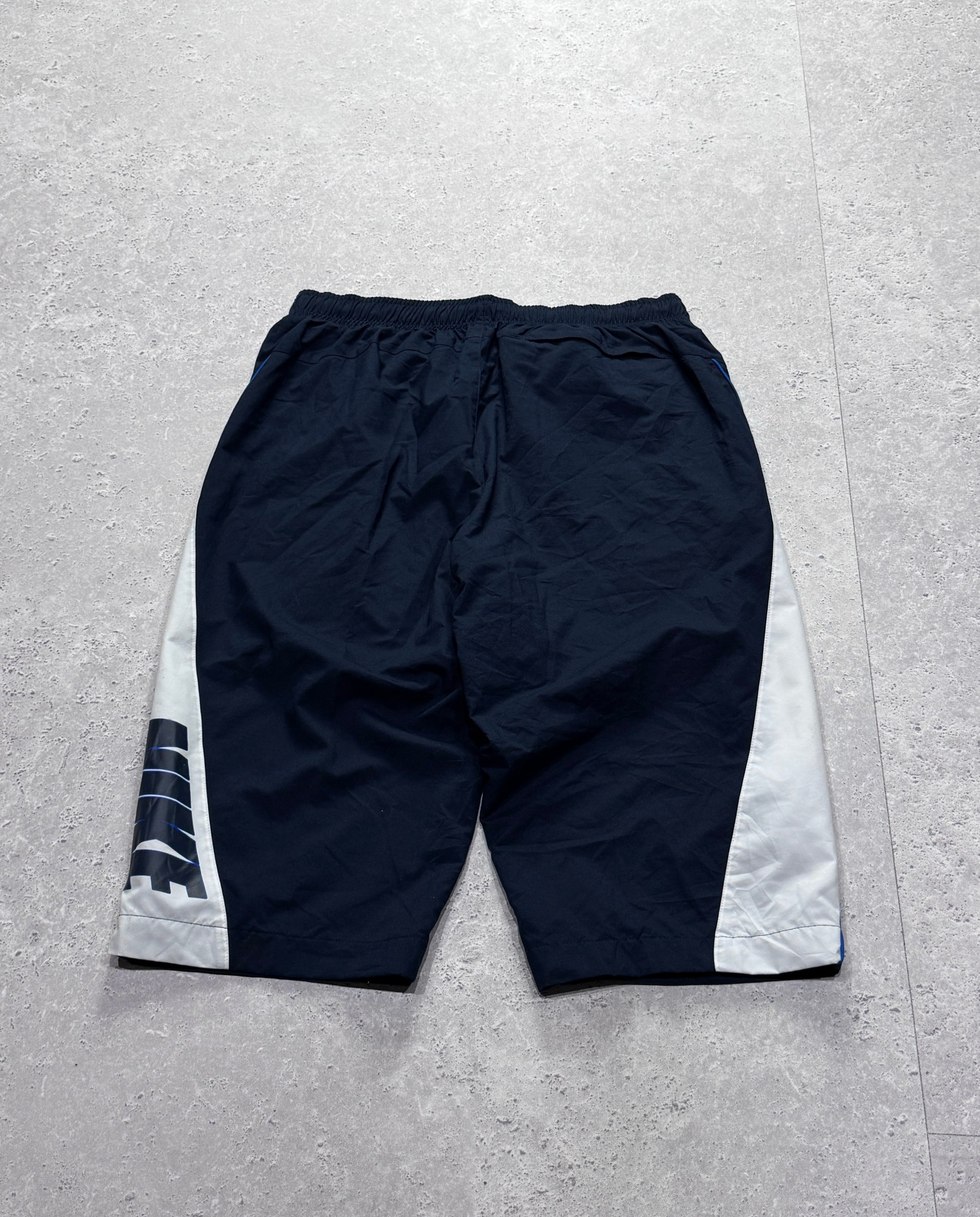 Vintage 2000s Nike Spellout 3/4 Track Shorts (L)
