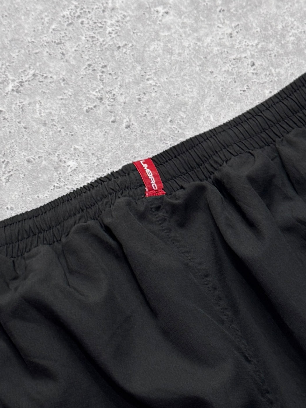 Vintage 2000s Umbro Adjustable 3/4 Track Shorts (M)
