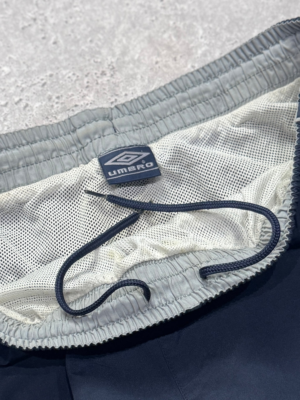 Vintage 2000s Umbro Spellout Track Shorts (XL)