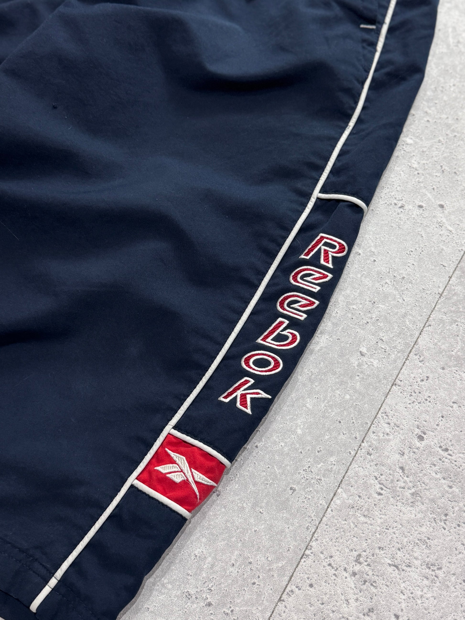 Vintage 2000s Reebok Spellout 3/4 Track Shorts (M)