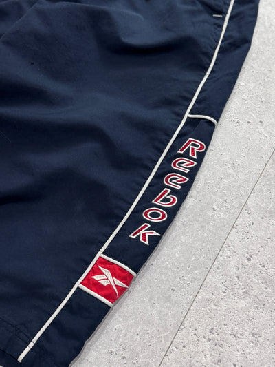 Vintage 2000s Reebok Spellout 3/4 Track Shorts (M)