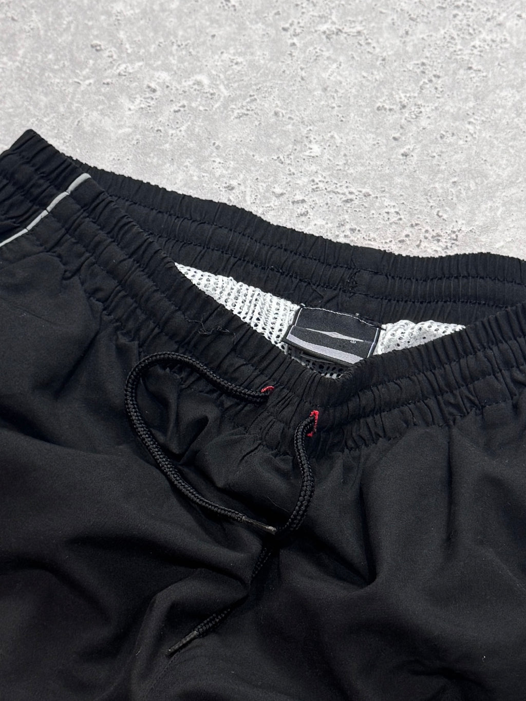 Vintage 2000s Umbro Track Shorts (L)