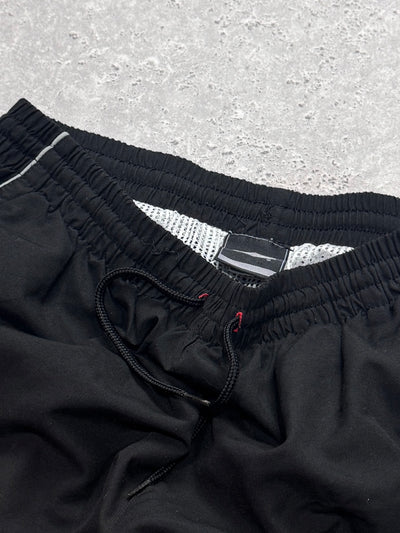 Vintage 2000s Umbro Track Shorts (L)