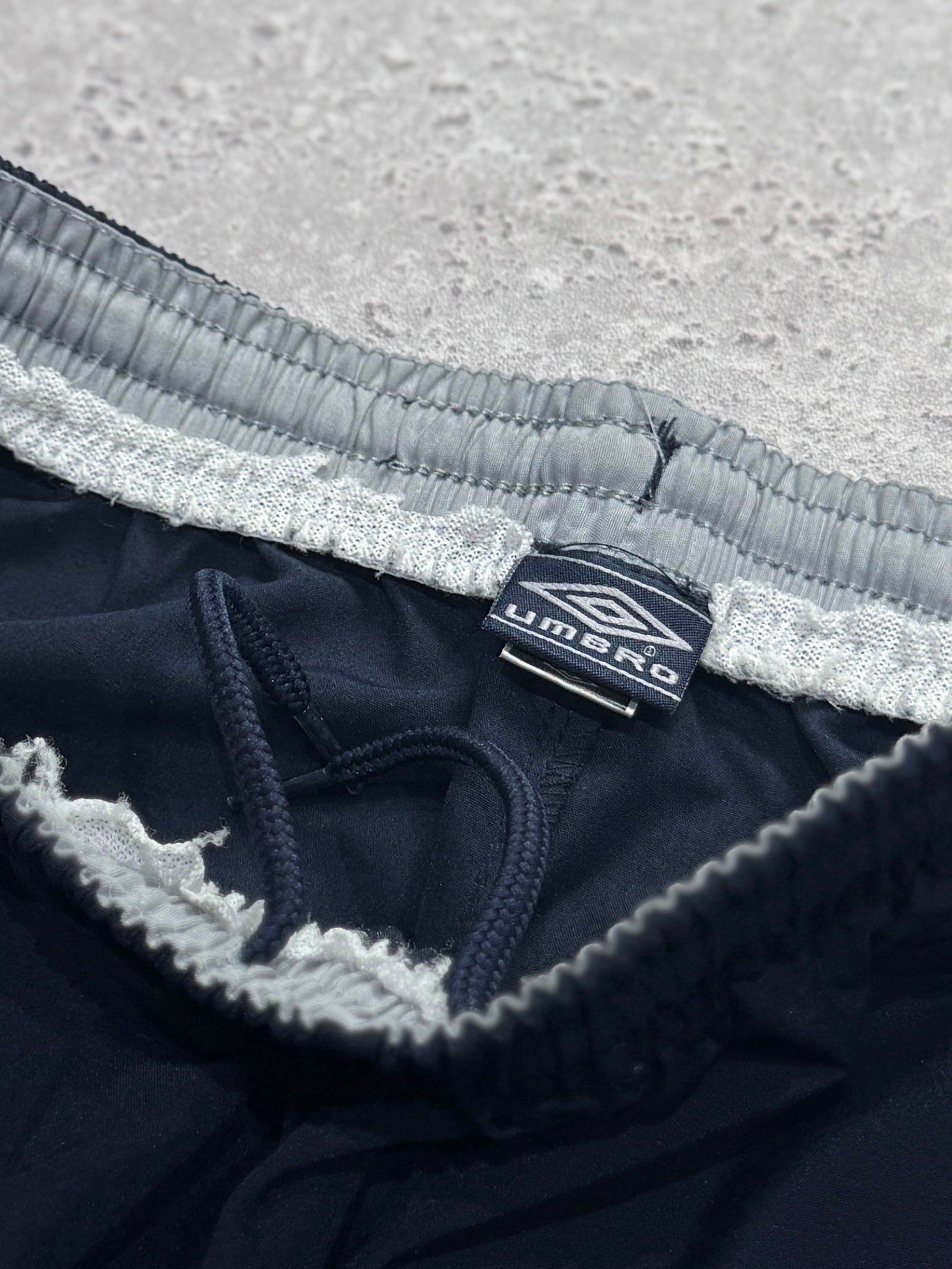 Vintage 2000s Umbro Spellout Track Shorts (XS)