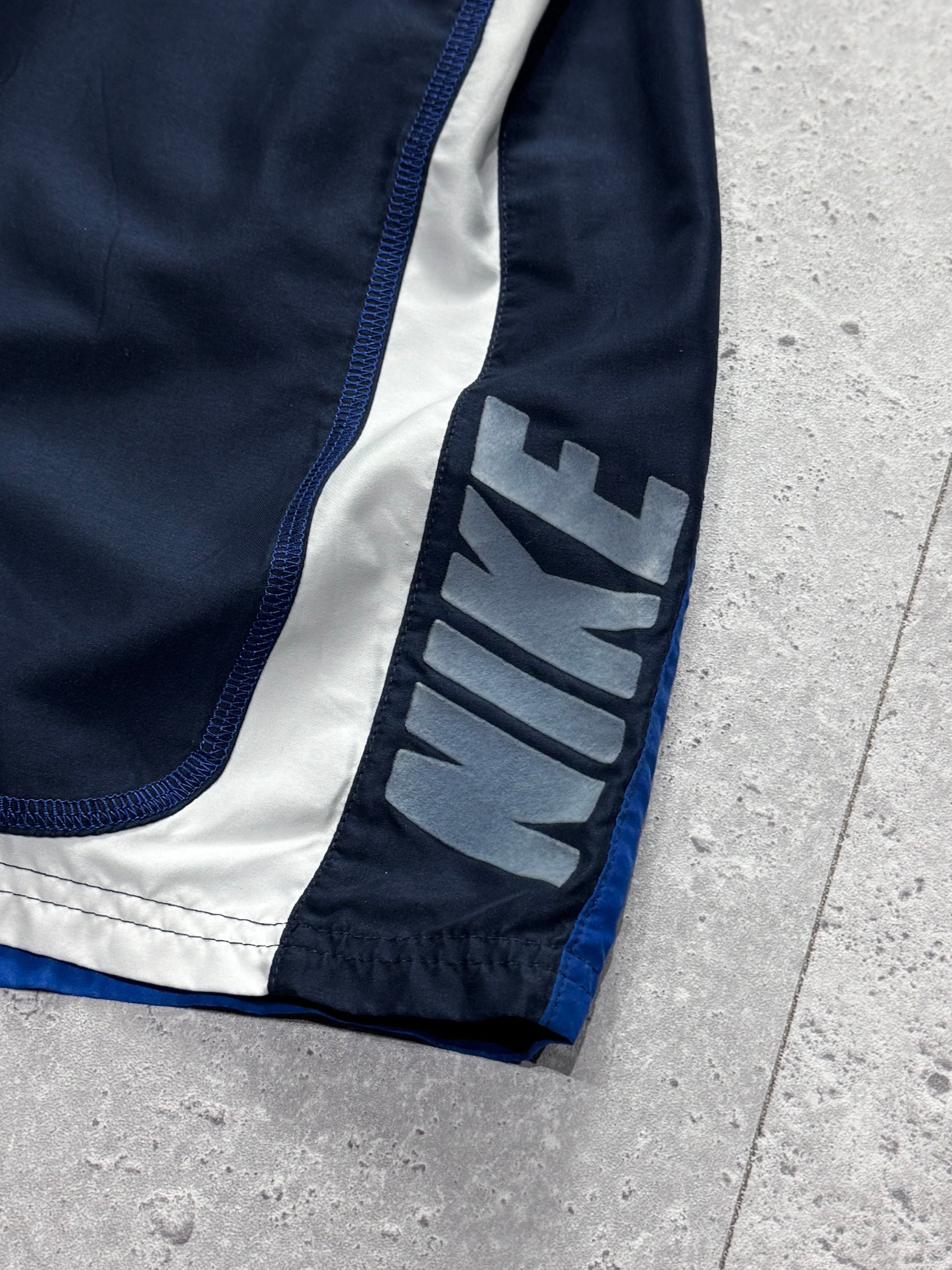 Vintage 2000s Nike Spellout Track Shorts (L)