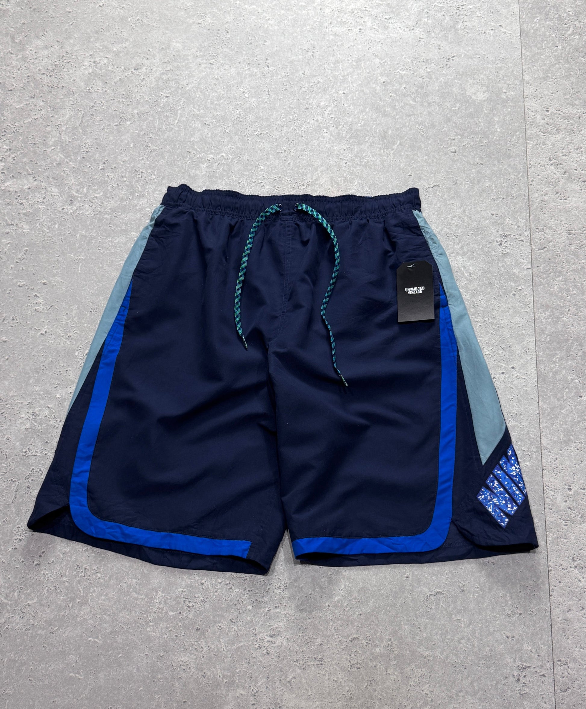 Vintage 2000s Nike Spellout Track Shorts (L)