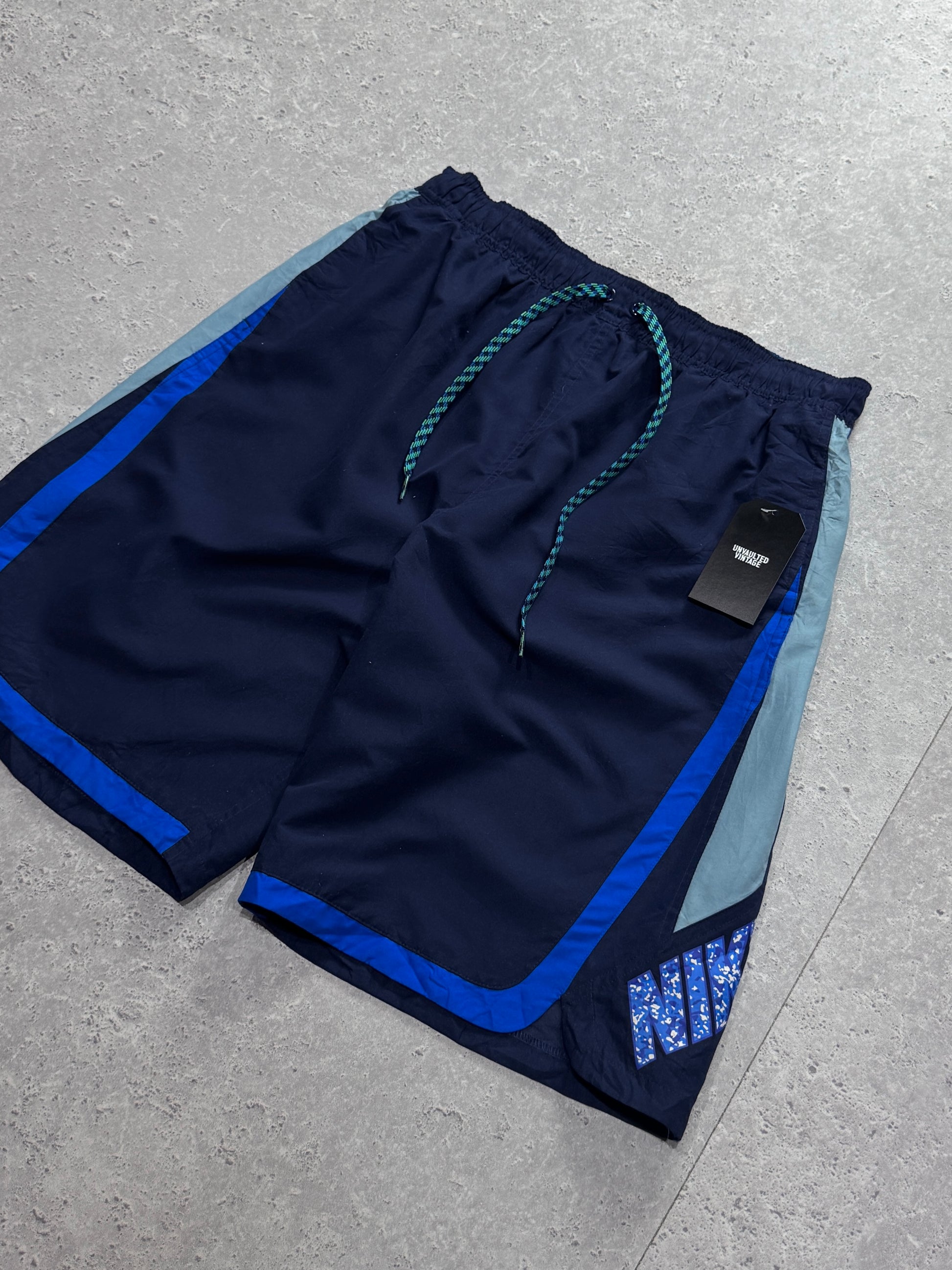 Vintage 2000s Nike Spellout Track Shorts (L)