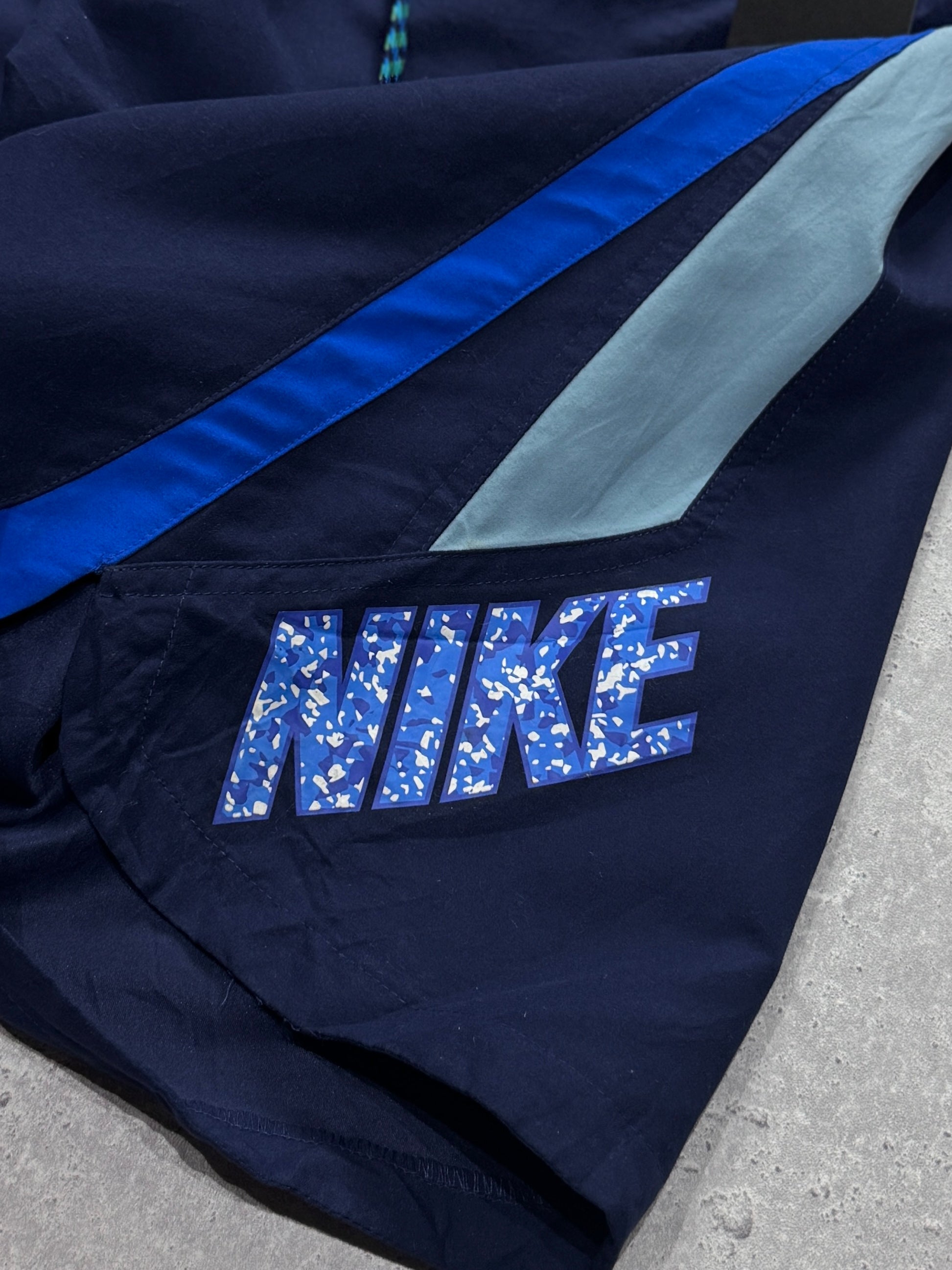 Vintage 2000s Nike Spellout Track Shorts (L)