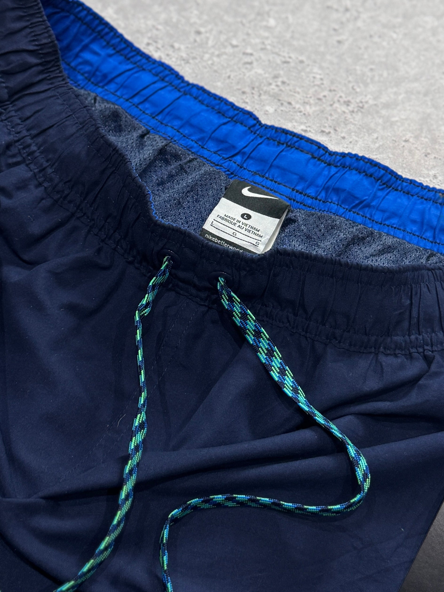 Vintage 2000s Nike Spellout Track Shorts (L)