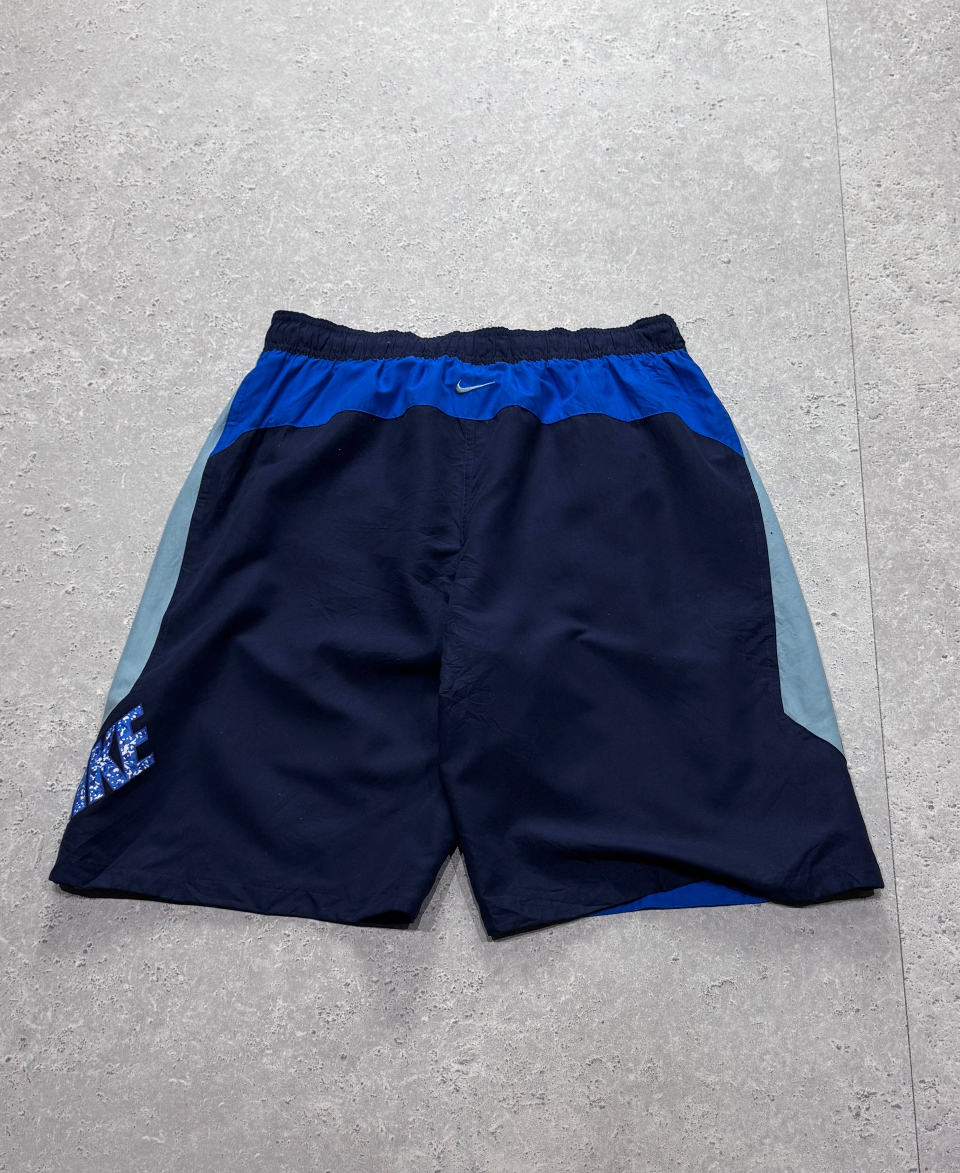 Vintage 2000s Nike Spellout Track Shorts (L)