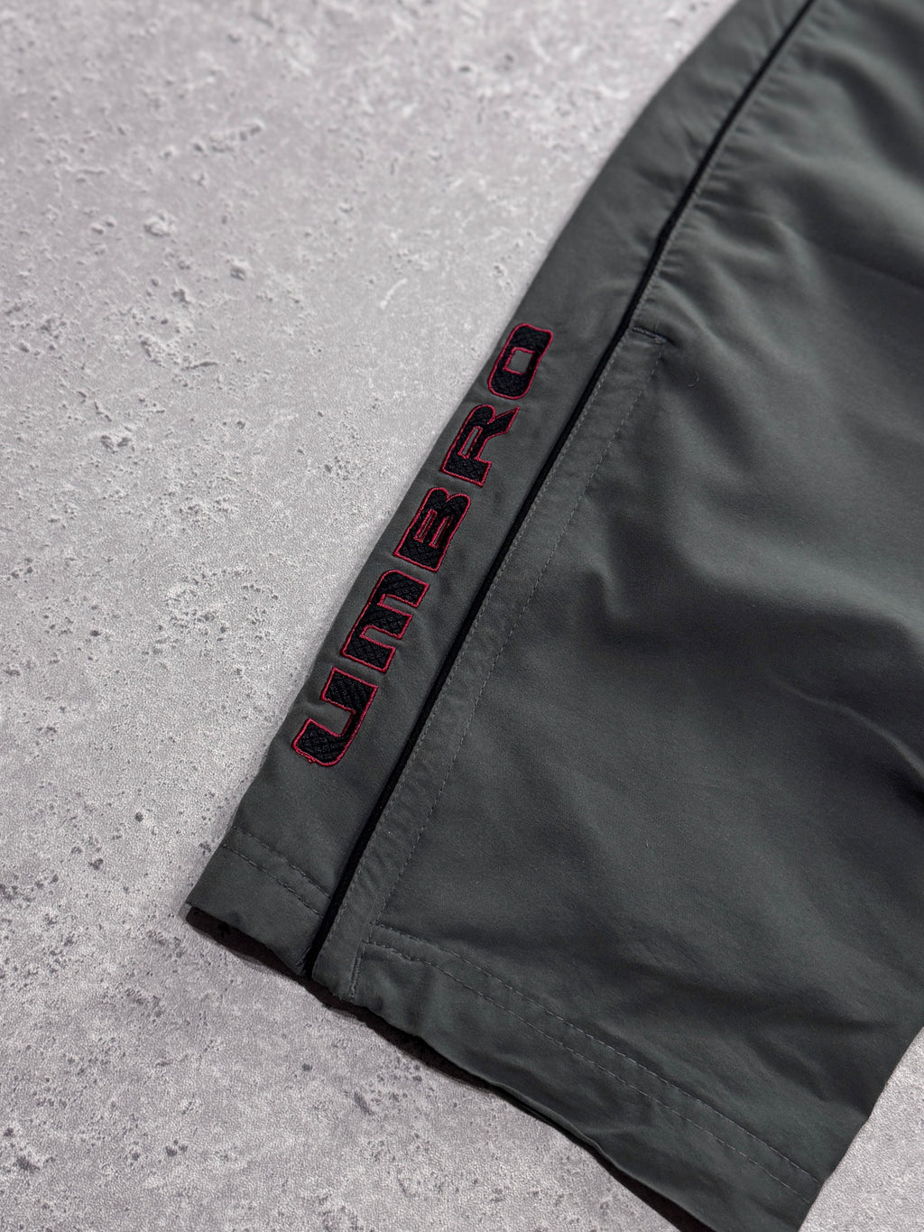 Vintage 2000s Umbro Spellout Track Pants (L)