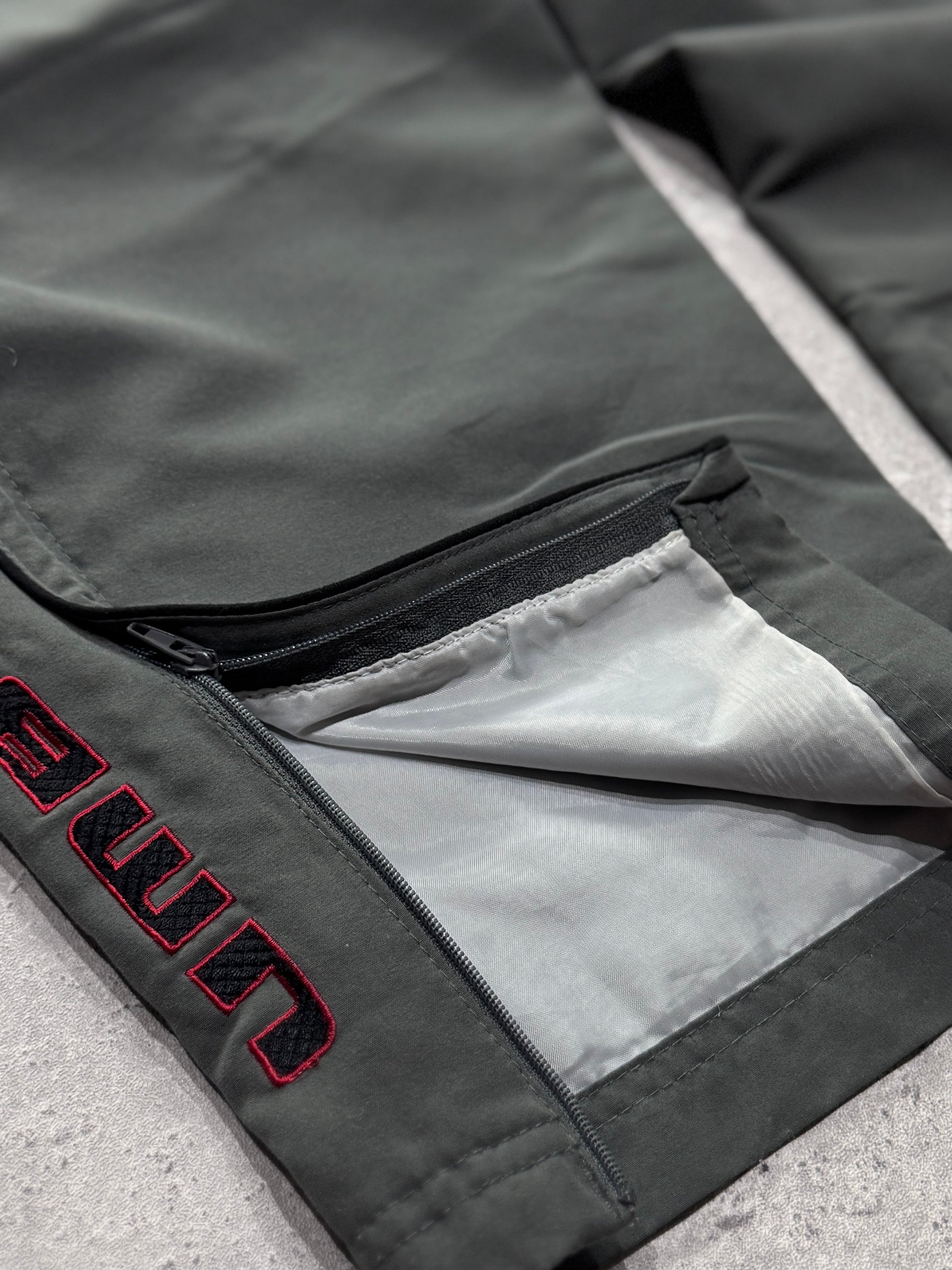 Vintage 2000s Umbro Spellout Track Pants (L)