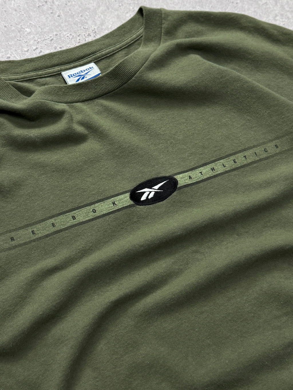 Vintage 2000s Reebok Athletics Spellout Tee (XL)