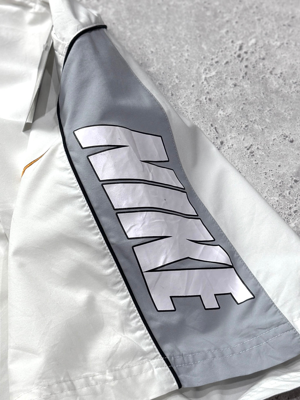Vintage 2000s Nike Spellout Track Shorts (S)