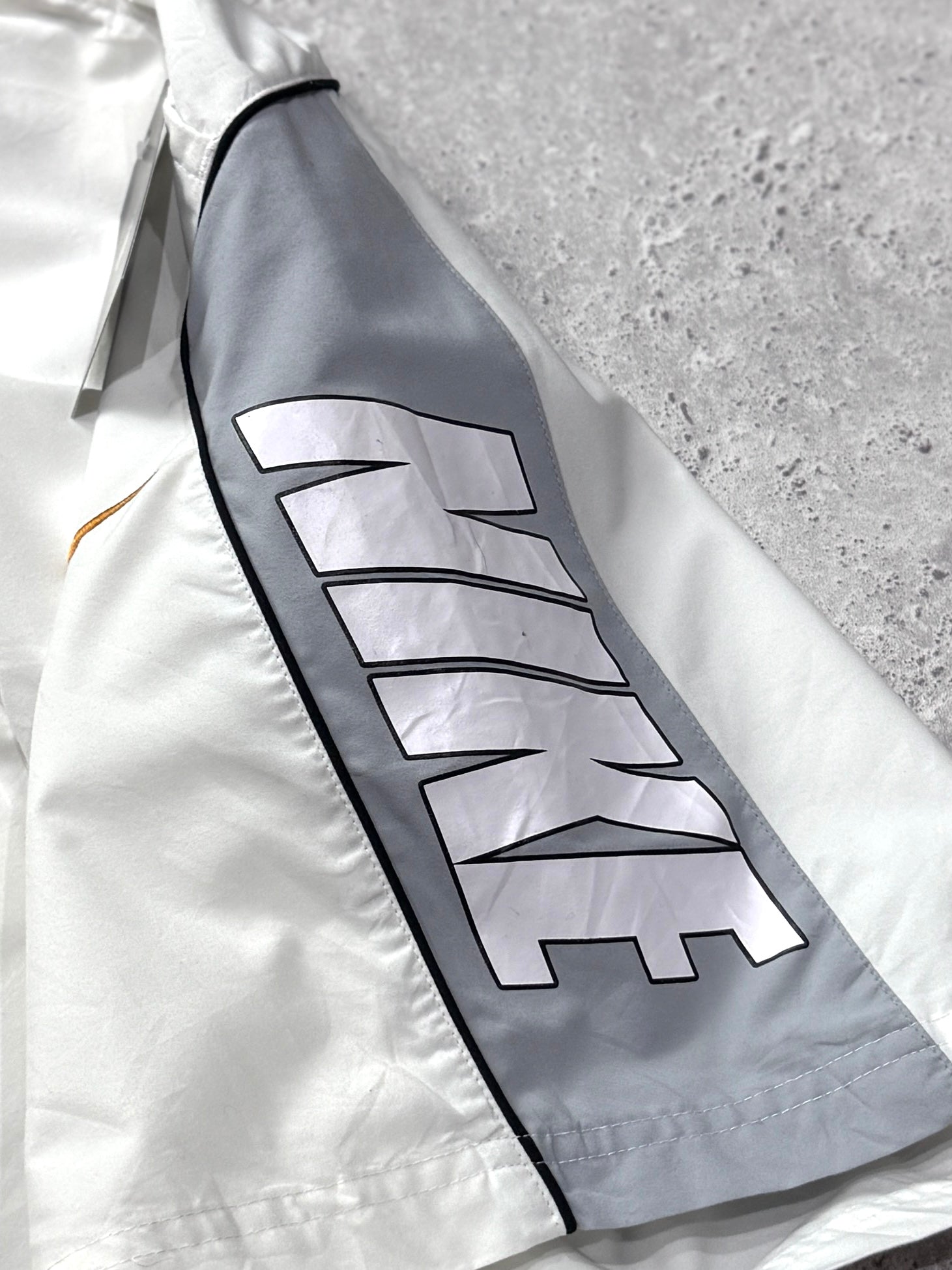 Vintage 2000s Nike Spellout Track Shorts (S)