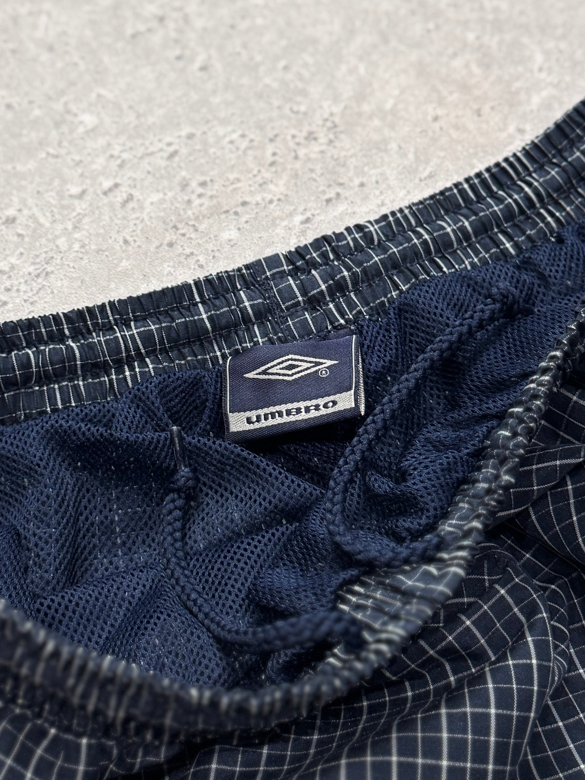 Vintage 2000s Umbro Plaid Track Shorts (L)