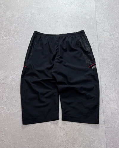 Vintage 2000s Umbro 3/4 Track Shorts (XL)