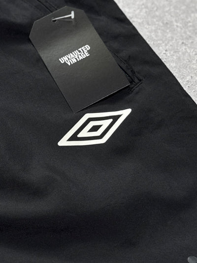 Vintage 2000s Umbro 3/4 Track Shorts (L)