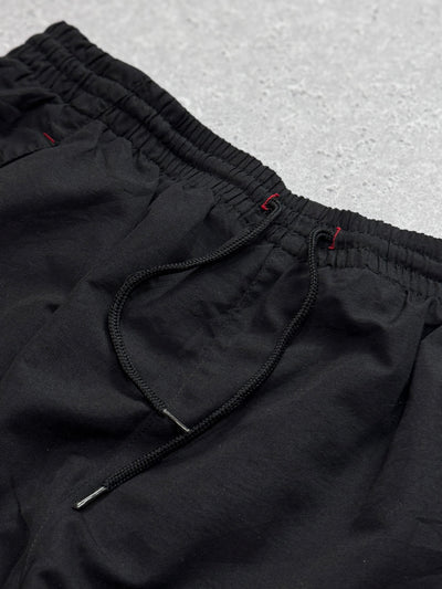Vintage 2000s Umbro Spellout 3/4 Track Shorts (L)