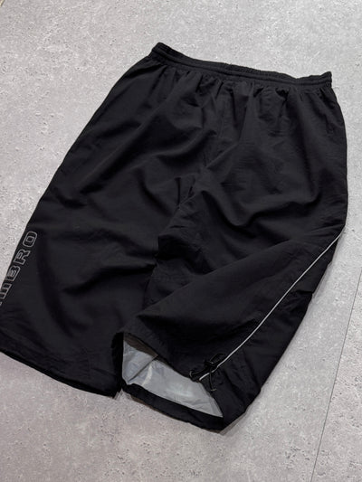Vintage 2000s Umbro Spellout 3/4 Track Shorts (L)