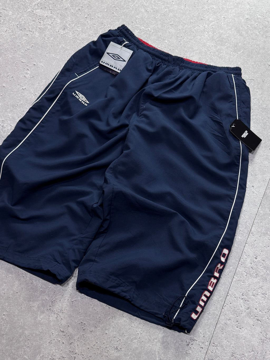 Vintage 2000s Deadstock Umbro Spellout 3/4 Track Shorts (32”)