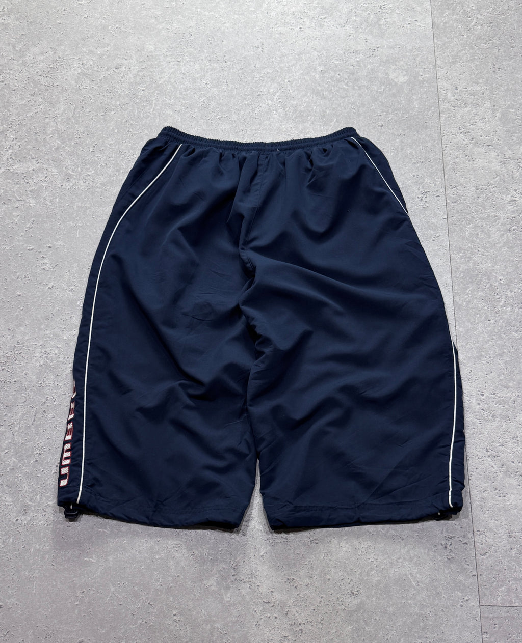 Vintage 2000s Deadstock Umbro Spellout 3/4 Track Shorts (32”)